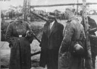 Belzec: Romany King Kwiek at the Entrance of the Labour
Camp for Sinti and Roma.